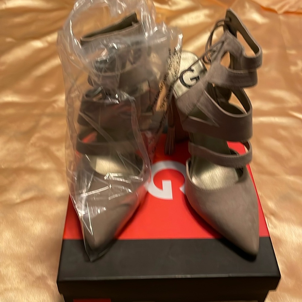 Beige with thick 4 inches heel. By Guess the size is 10. Never been worn